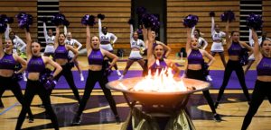 Cheer and Dance teams performing inside Mabee Fieldhouse