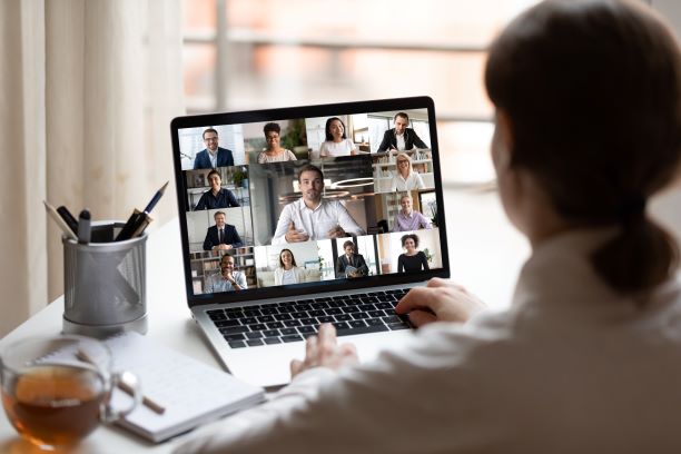 woman hosting a zoom virtual meeting
