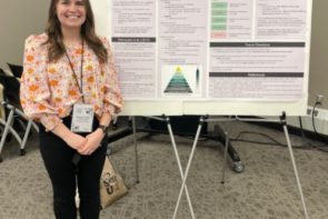 Eleanor Dick with poster presentation