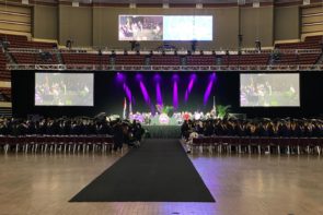 Commencement stage and students at 2022 celebration