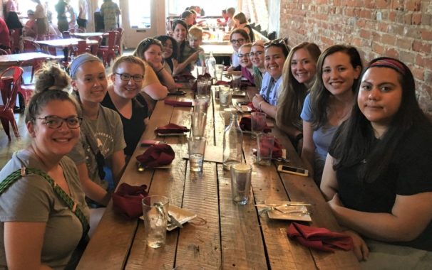 Students at dining table during campus retreat