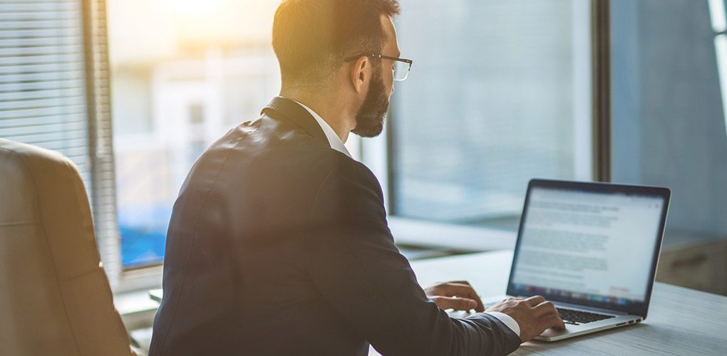 Business man at a computer