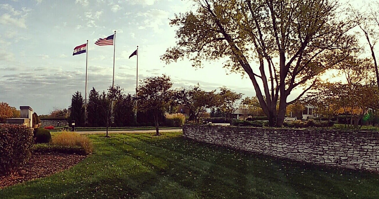 Evening view of the JHOP Plaza with the flag poles in the background