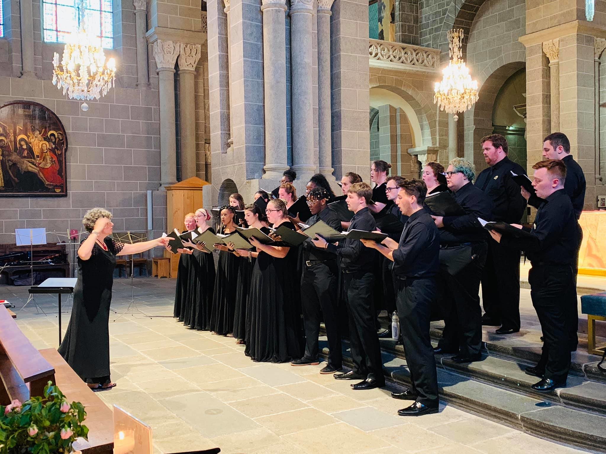 Choir performs in a church space.