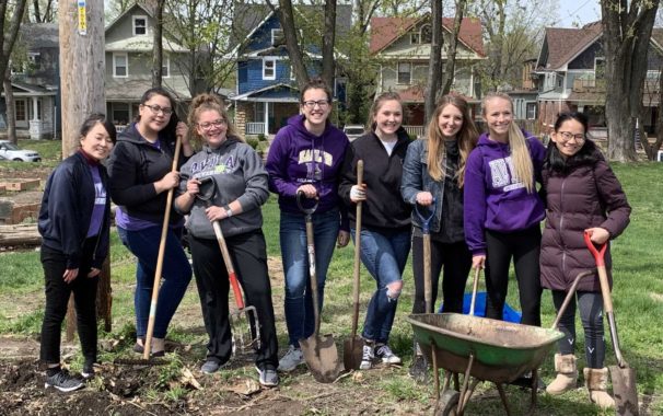 Group of students gardening during Dear Neighbor Day