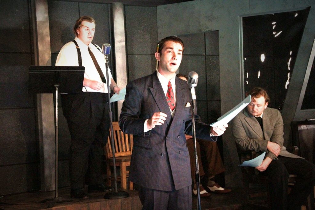 Student performers on stage for War of the Worlds