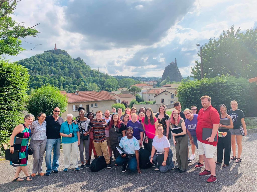 Group photo of Avila choir members in LePuy, France