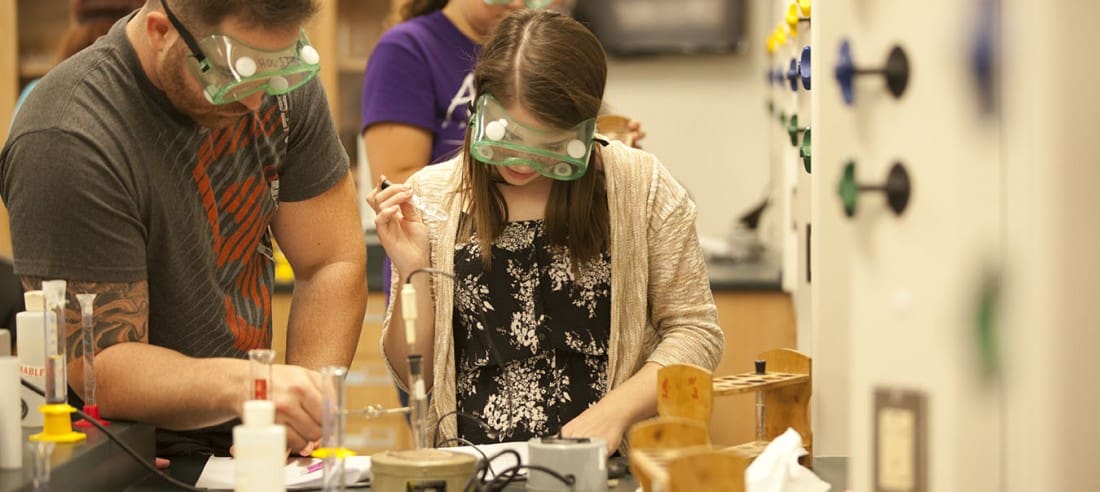 Two students in the Microbiology lab