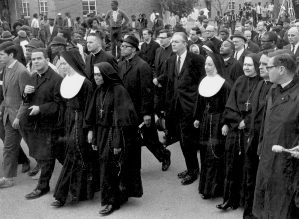 Historical photo of Sisters of St. Joseph marching in Selma