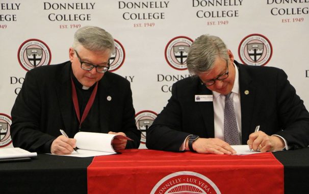 Avila President and Donnelly President sign agreement