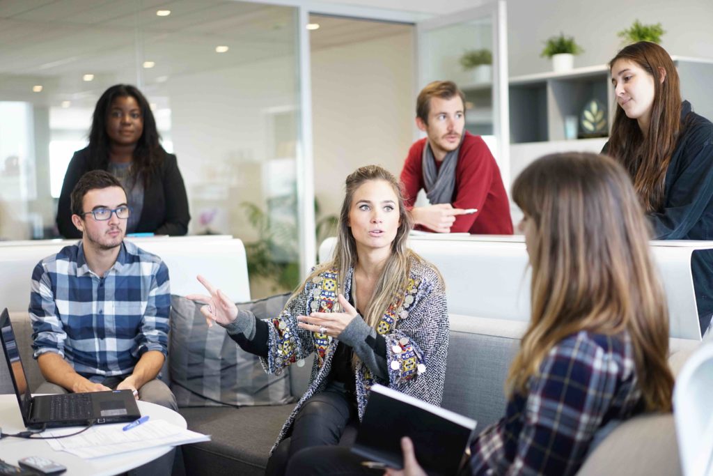 Six people collaborating in a casual workplace