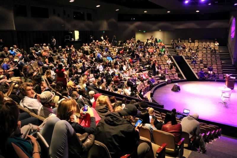 Students seated inside Goppert Theatre for a lecture