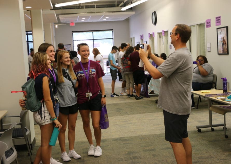 A group of female students poses for a picture