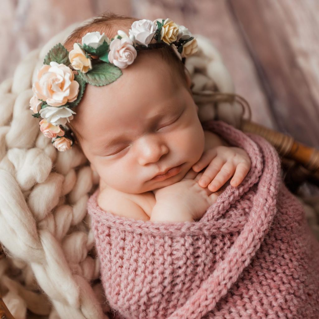 Photo of baby in rose crown