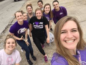 Group selfie of nine students