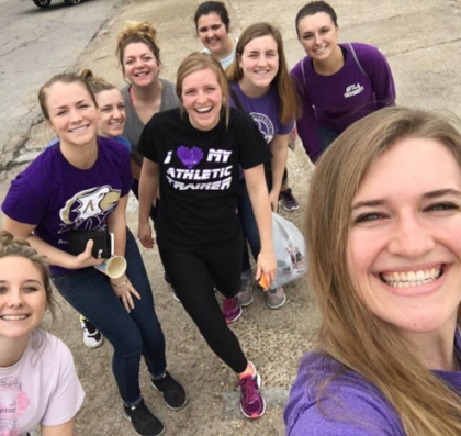 Group selfie of nine students