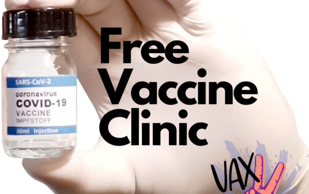 Hand holding vaccine vile. Free vaccine clinic.