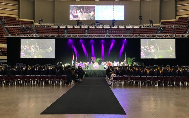 Commencement stage and students at 2022 celebration