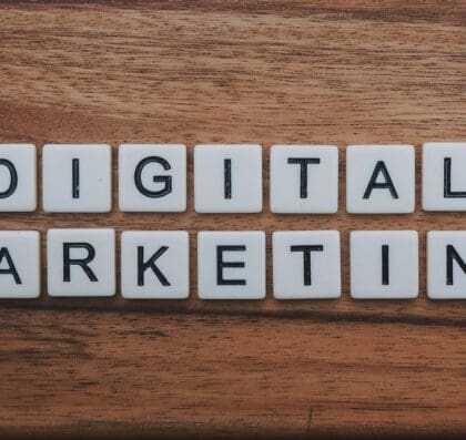 digital marketing artwork on brown wooden surface