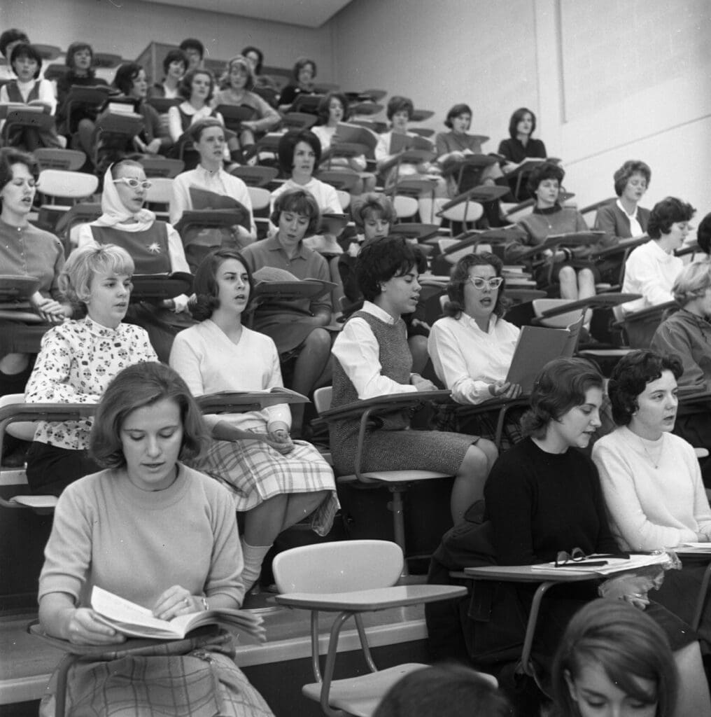 Students sit in a classroom.