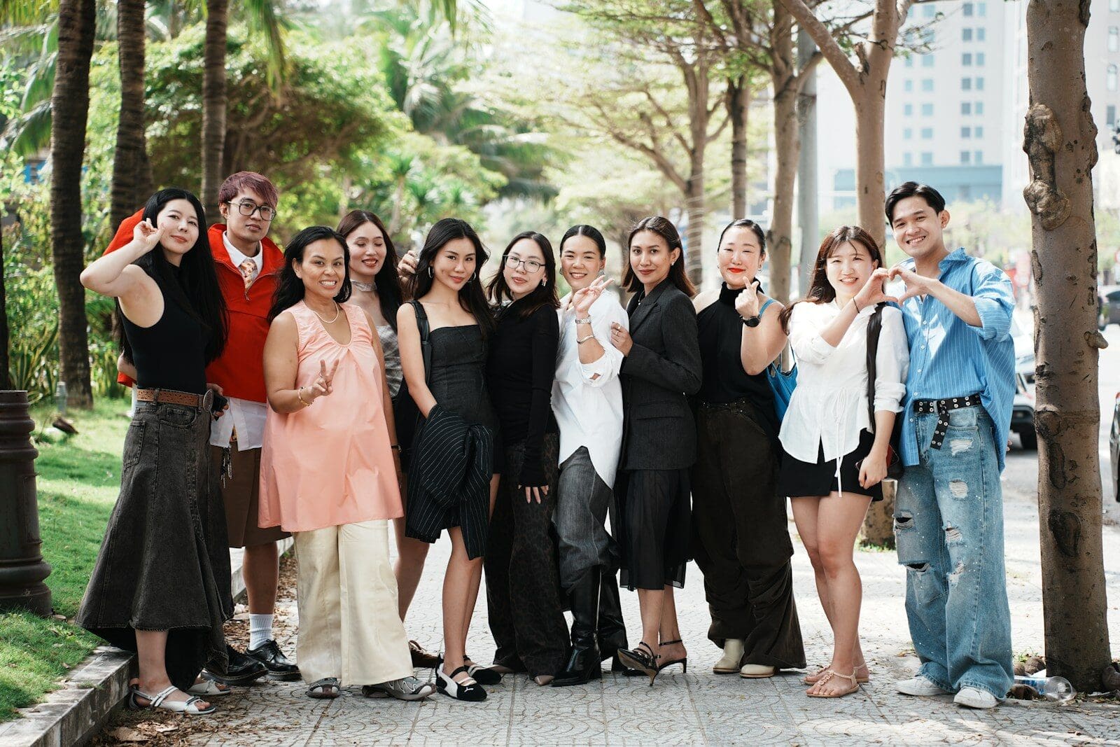 A diverse group of young adults posing for a photo